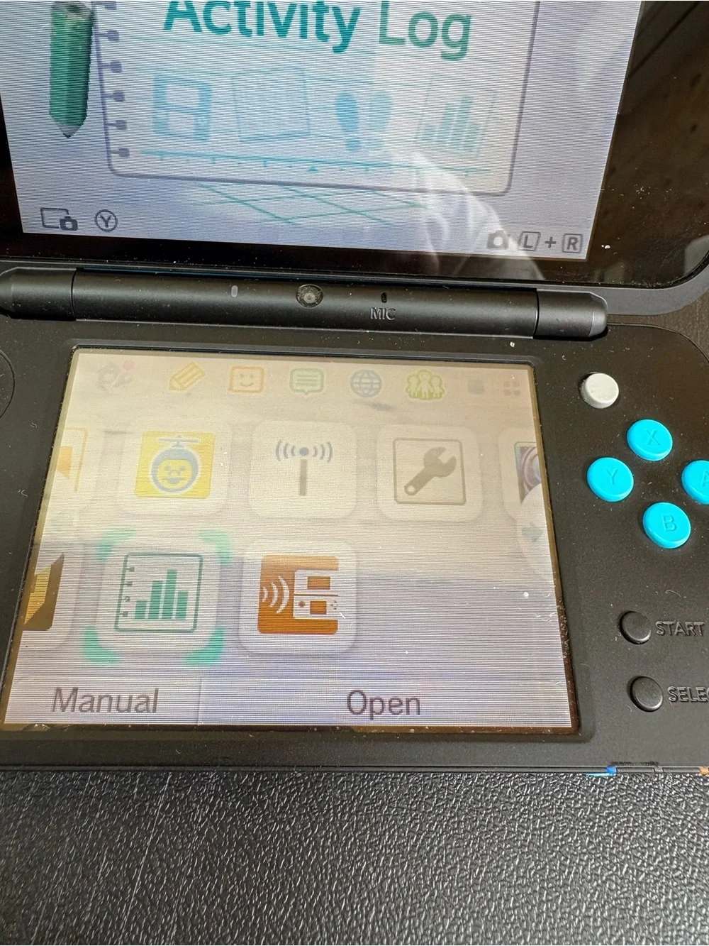 Nintendo 2DS XL Handheld Console - Black with Turquoise Buttons